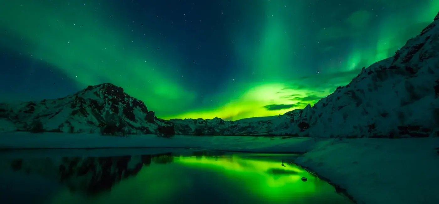 Northern Lights View of Reykjavík, Iceland | Orbis Vacation Canada